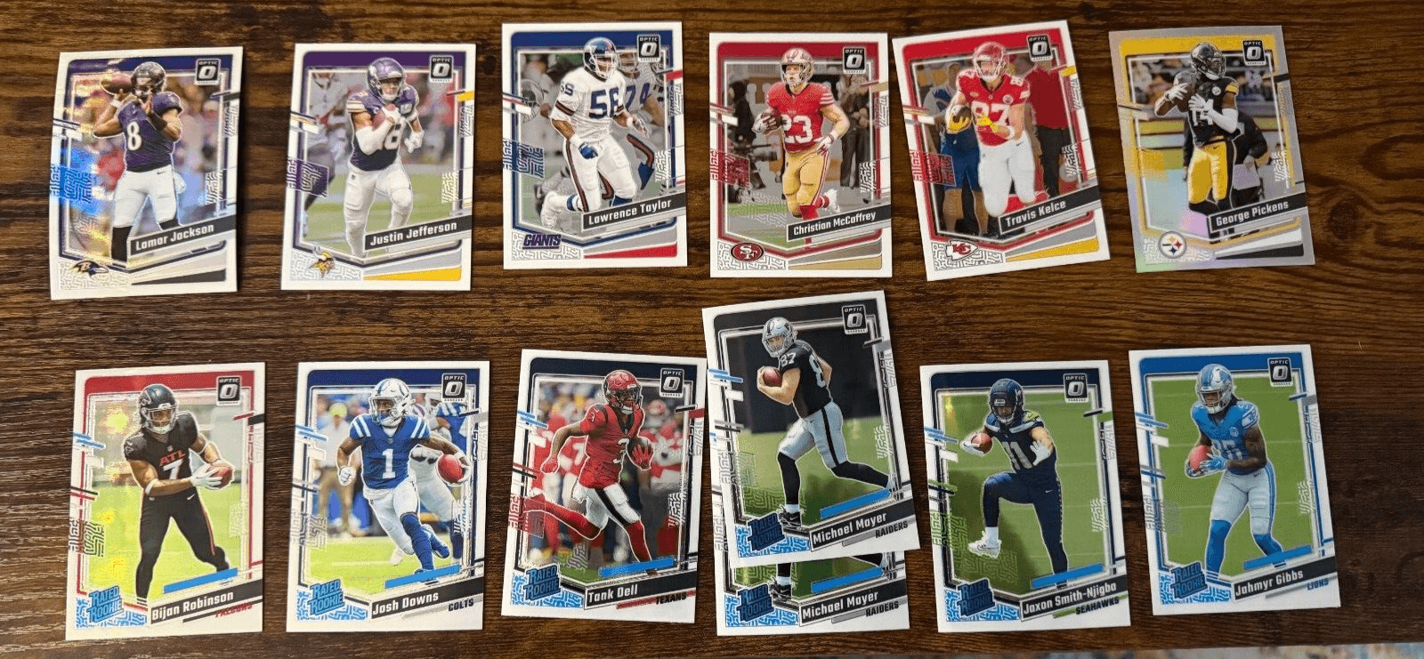 2023 Donruss Optic Lamar Bijan McCaffery Kelce Pickens Gibbs Mayer Dell